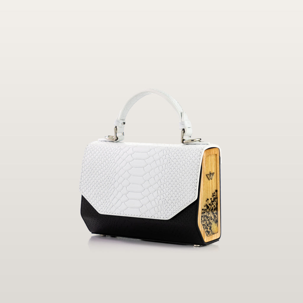 White and black handbag with wooden accent 