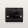Black crocodile-patterned wallet on a light gray background