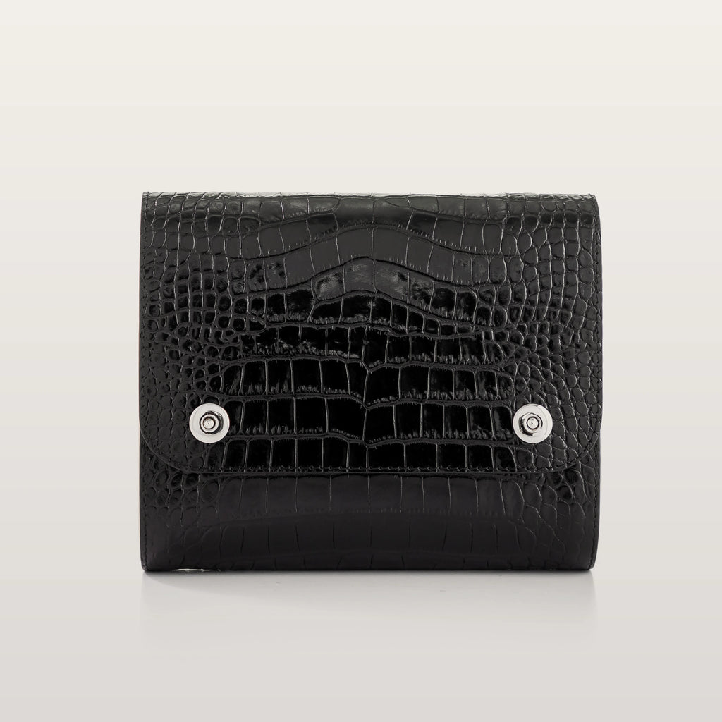 Black crocodile-patterned wallet on a light gray background