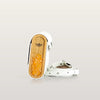 Wooden lighter with a white strap on a light gray background