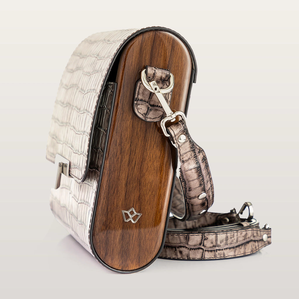 Side view of BLACKWOOD Gloria Brown Croco handbag with wooden panel and chain strap