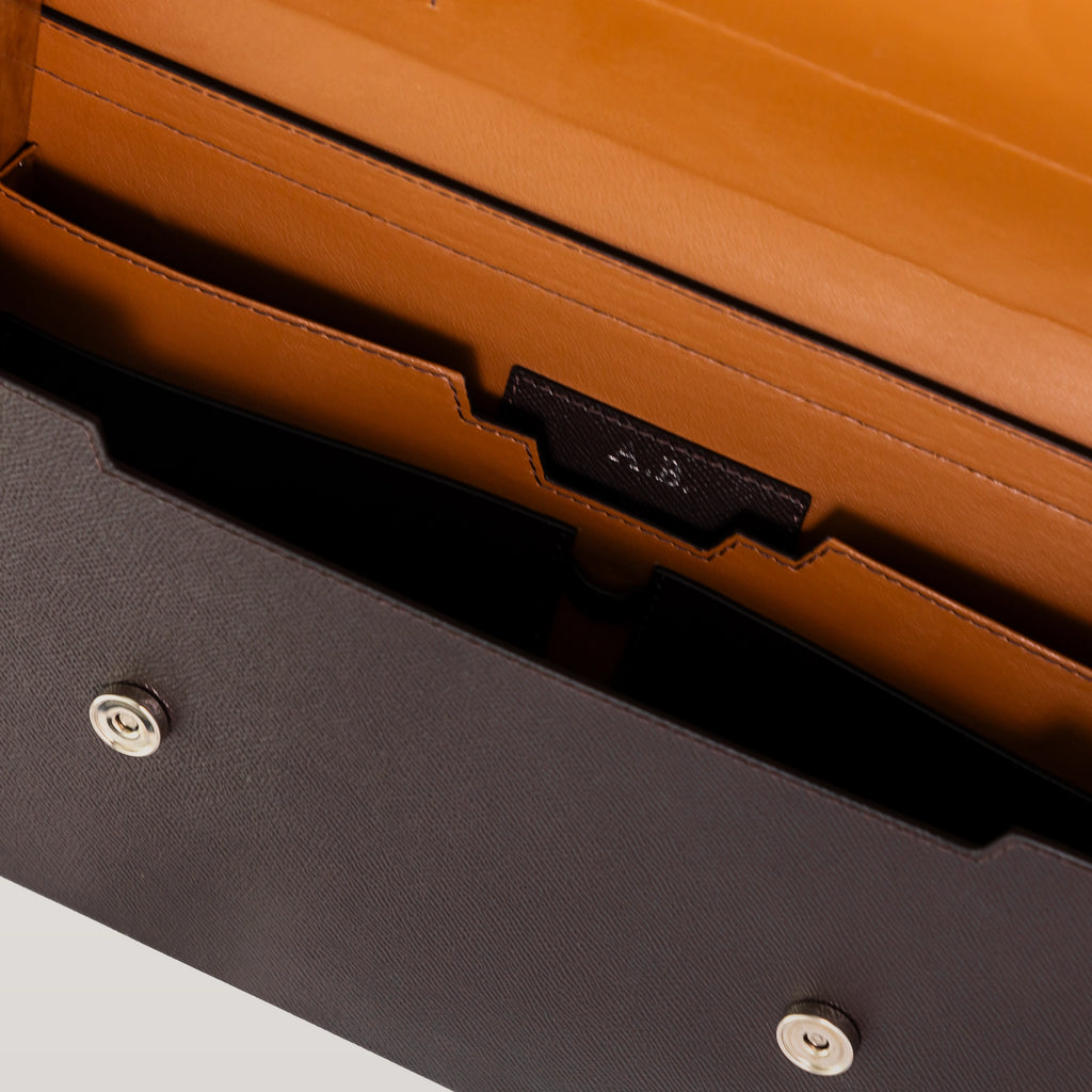 Close-up of BLACKWOOD Thunder Brown Epsom bag interior and premium metal hardware